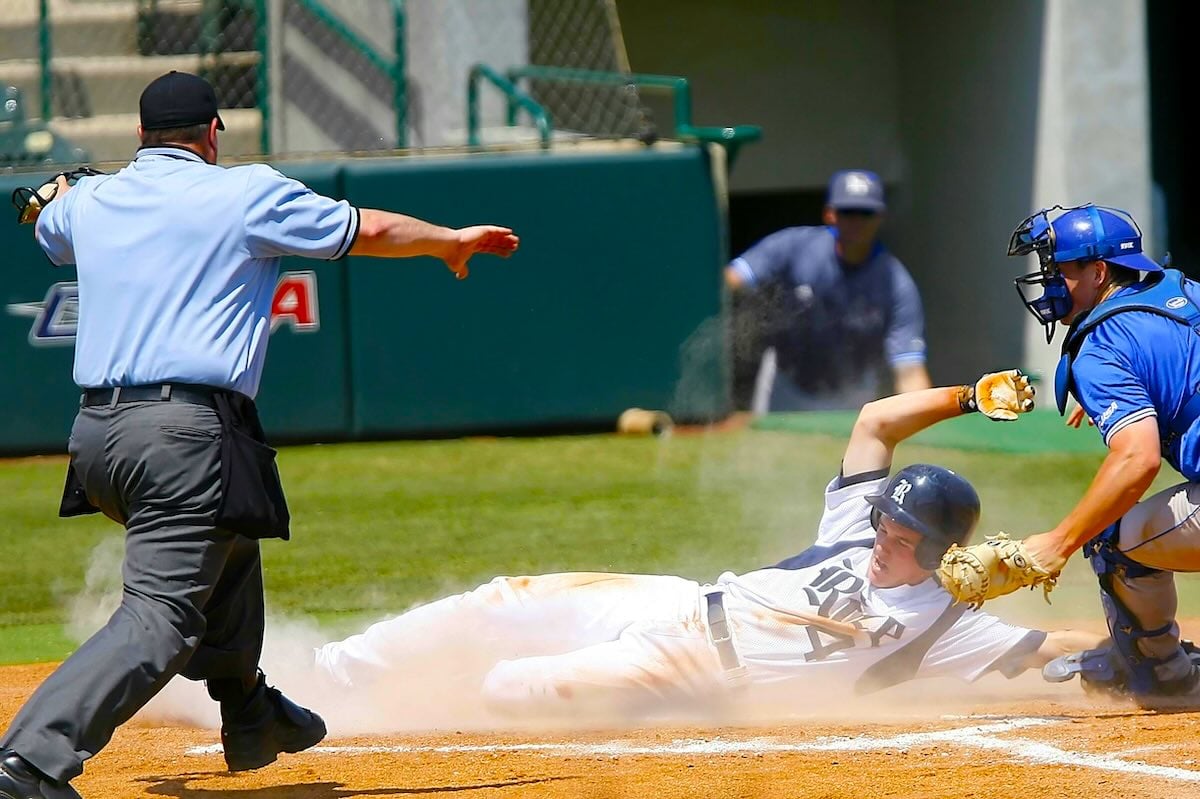 This player has just scored a run in Baseball