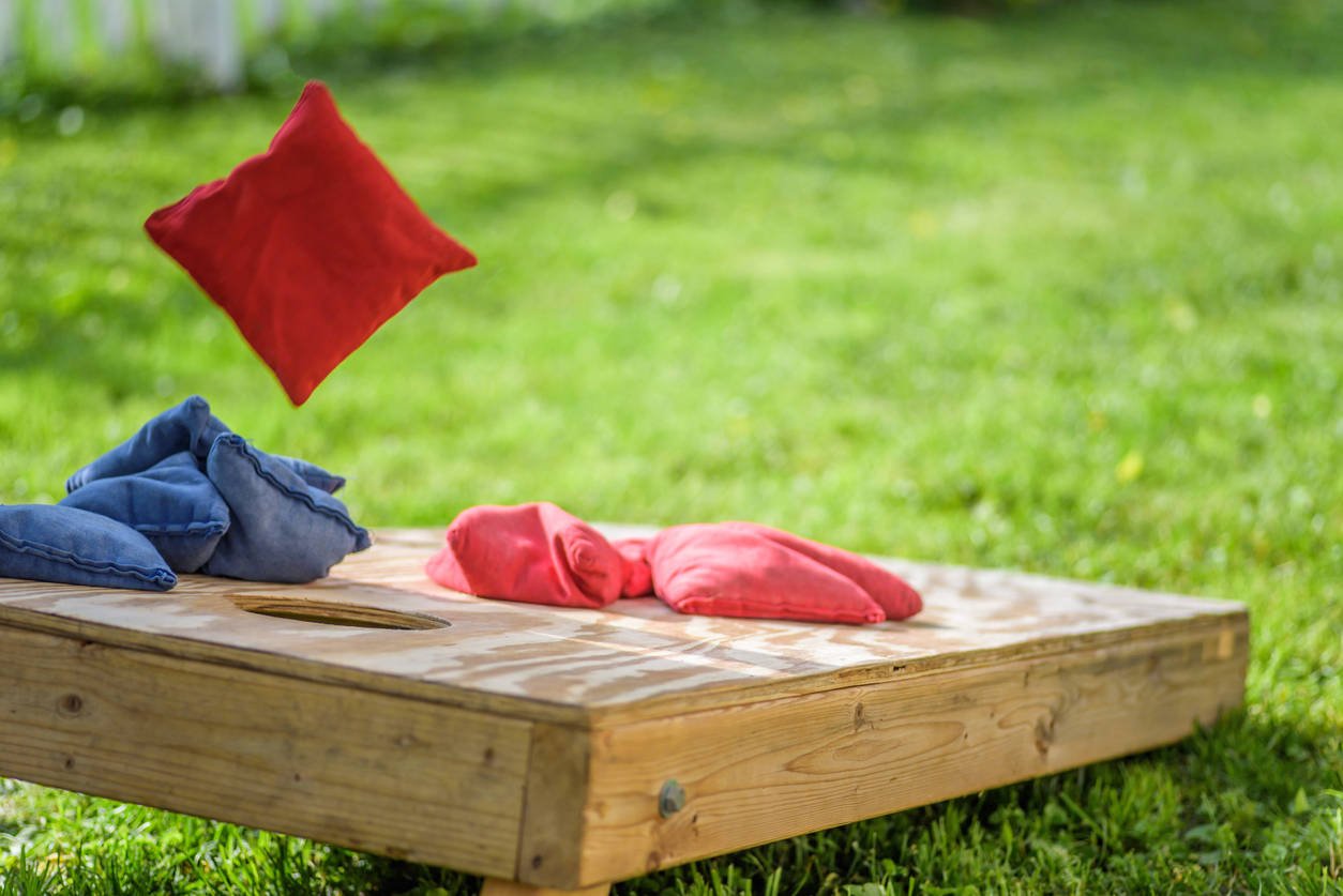 Understand how cornhole scoring works and explore the best scoreboards for keeping track of your game.