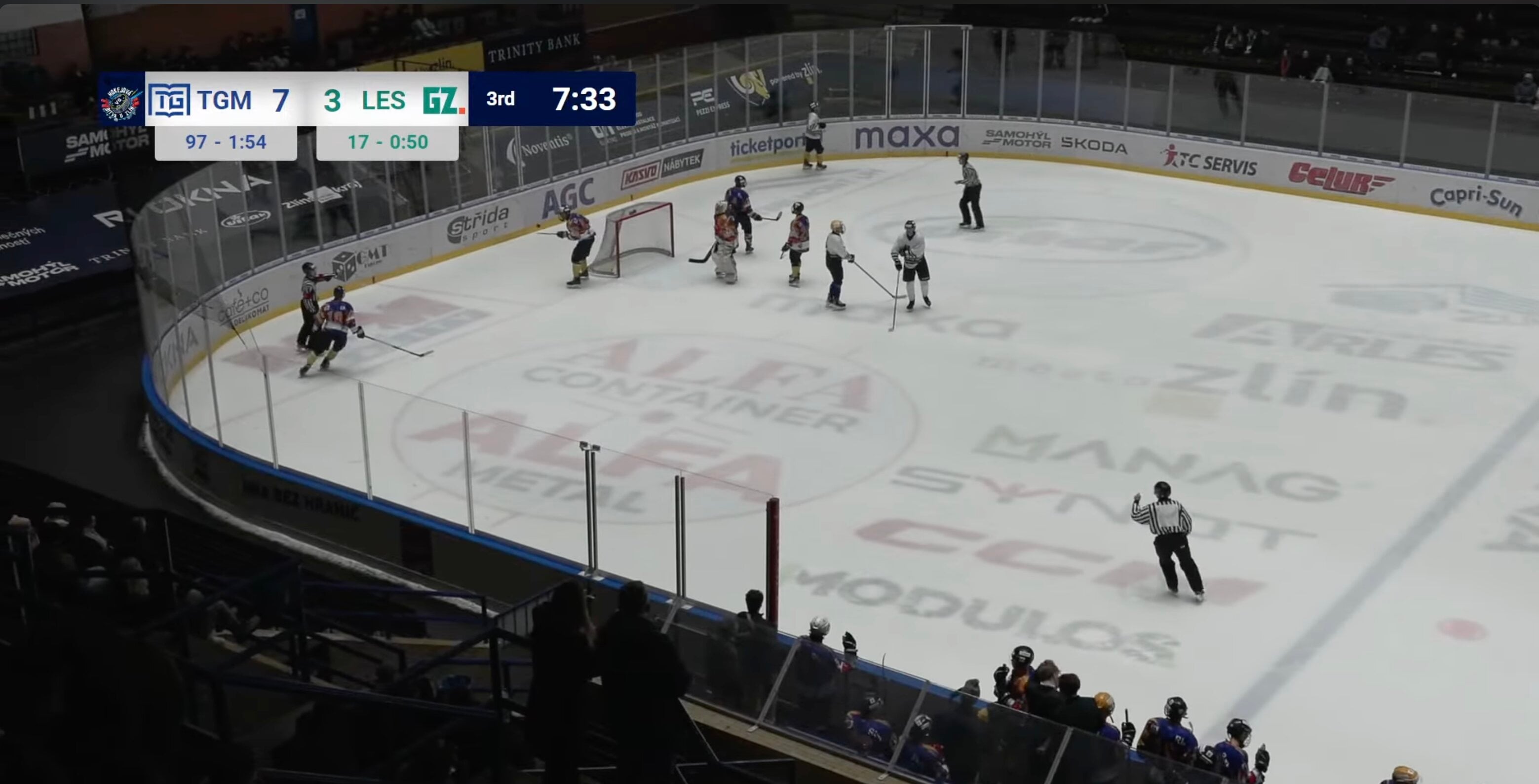 Professional scoreboard overlay showing TGM vs LES match