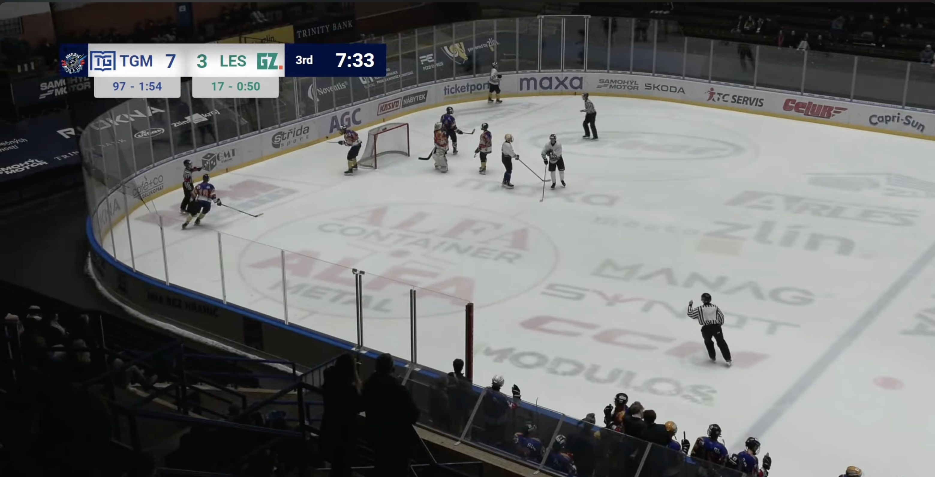 Professional scoreboard overlay showing TGM vs LES match