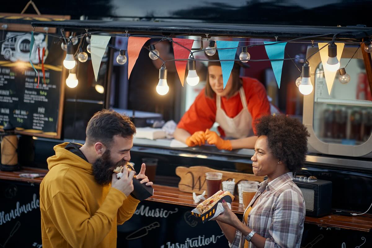 2 people at a food truck