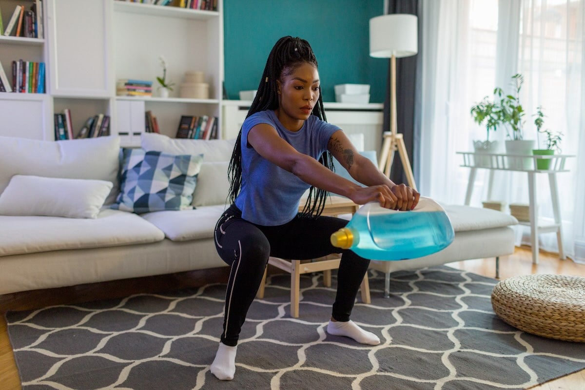 Woman doing chores whilst training