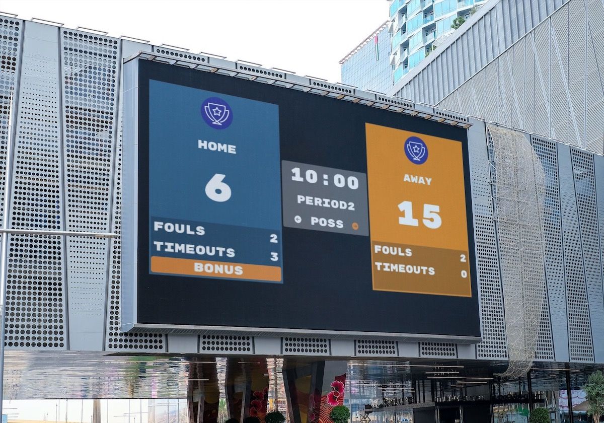 An outdoor softball scoreboard. The scoreboard is being controlled by a web-browser